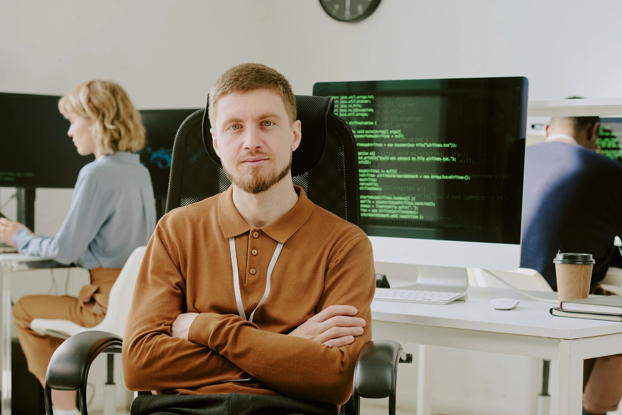 Cybersecurity professional in a modern IT office