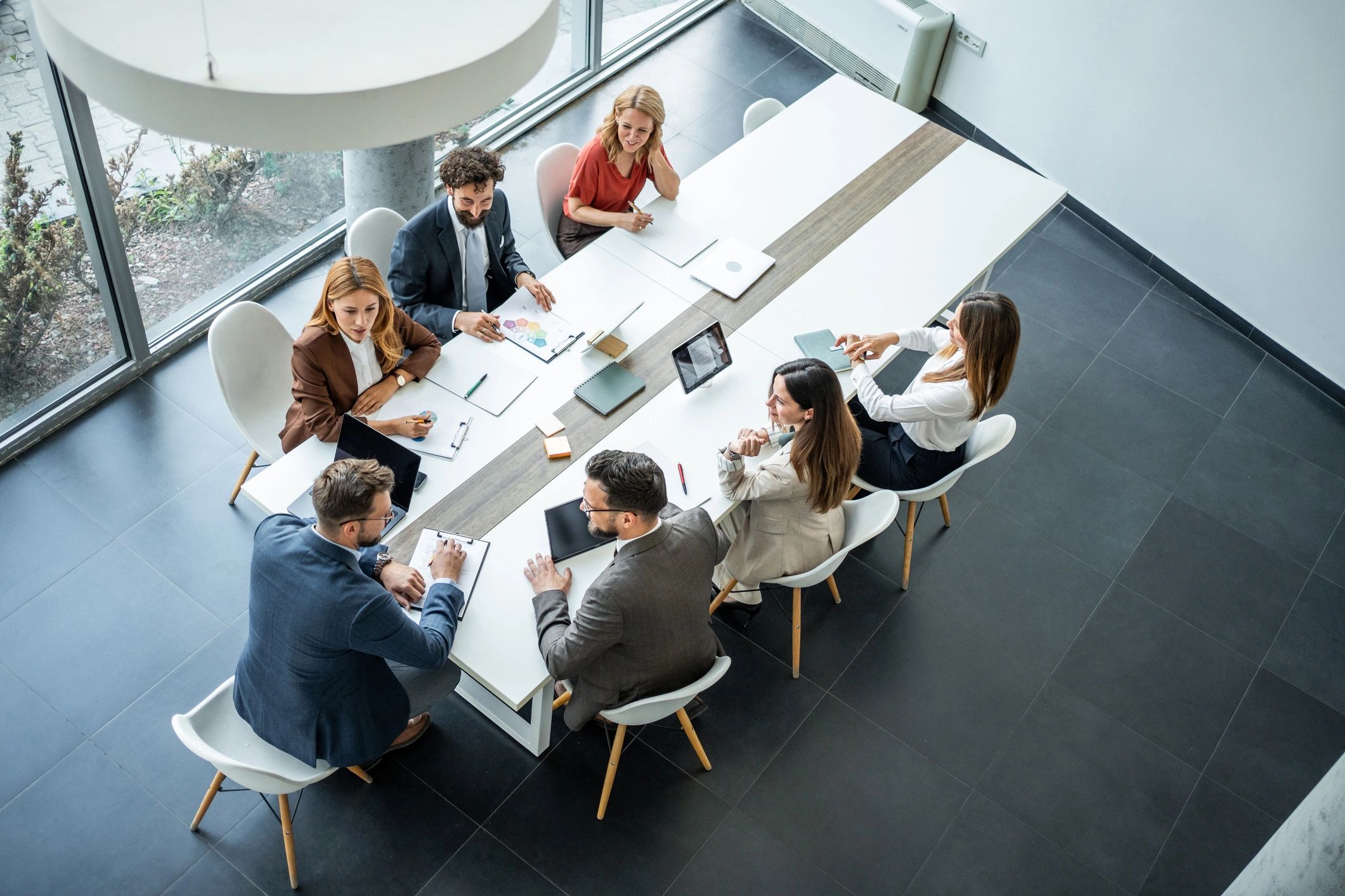 Business and technology leaders in a strategic planning meeting