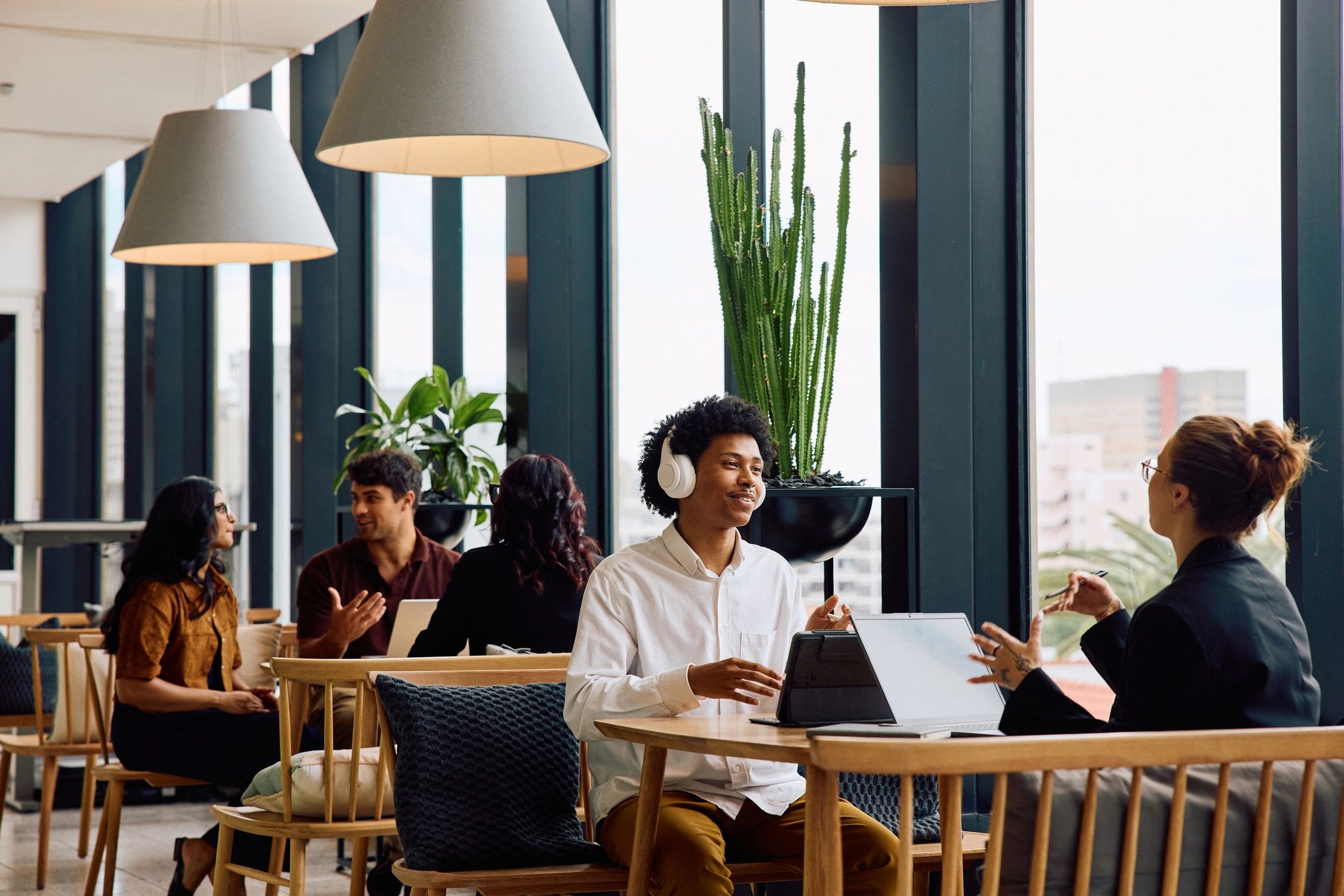 Technology consultants collaborating in a bright office