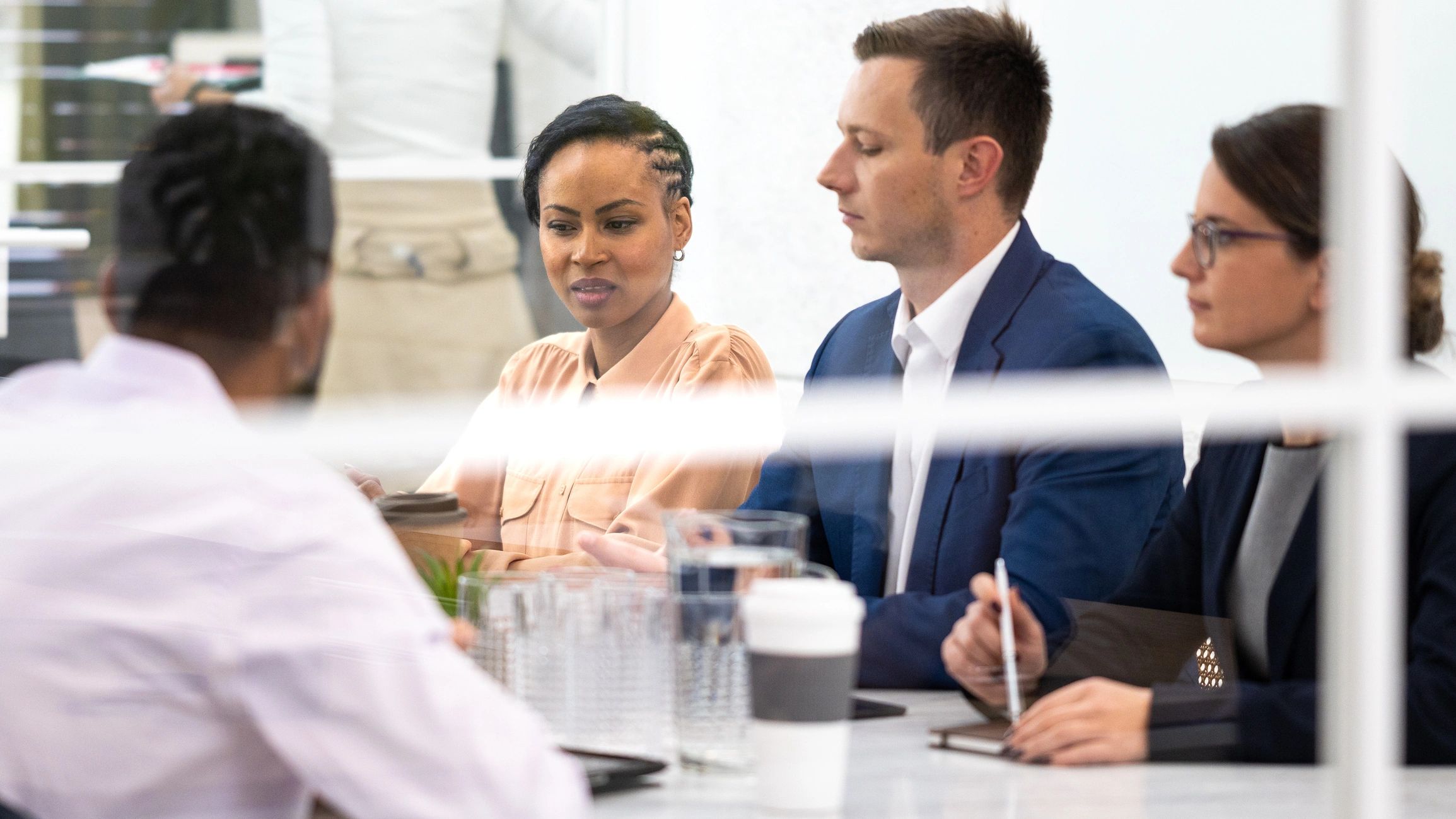 South African professionals discussing technology strategy in a boardroom